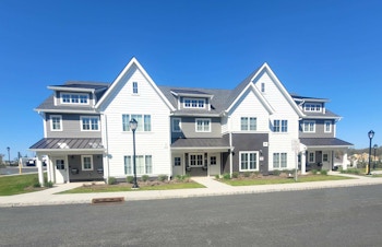 Exterior of Florham Park Supported Apartments, painted white and various shades of gray