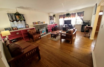 A living room at Arc/Morris Hanover Group Home featuring hardwood floors
