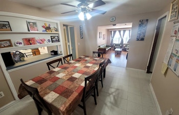 A dining room with a table at Arc/Morris Parsippany Group Home